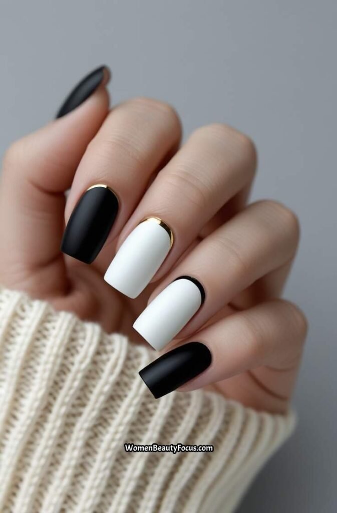 2. Minimalist Black and White Nail Art
