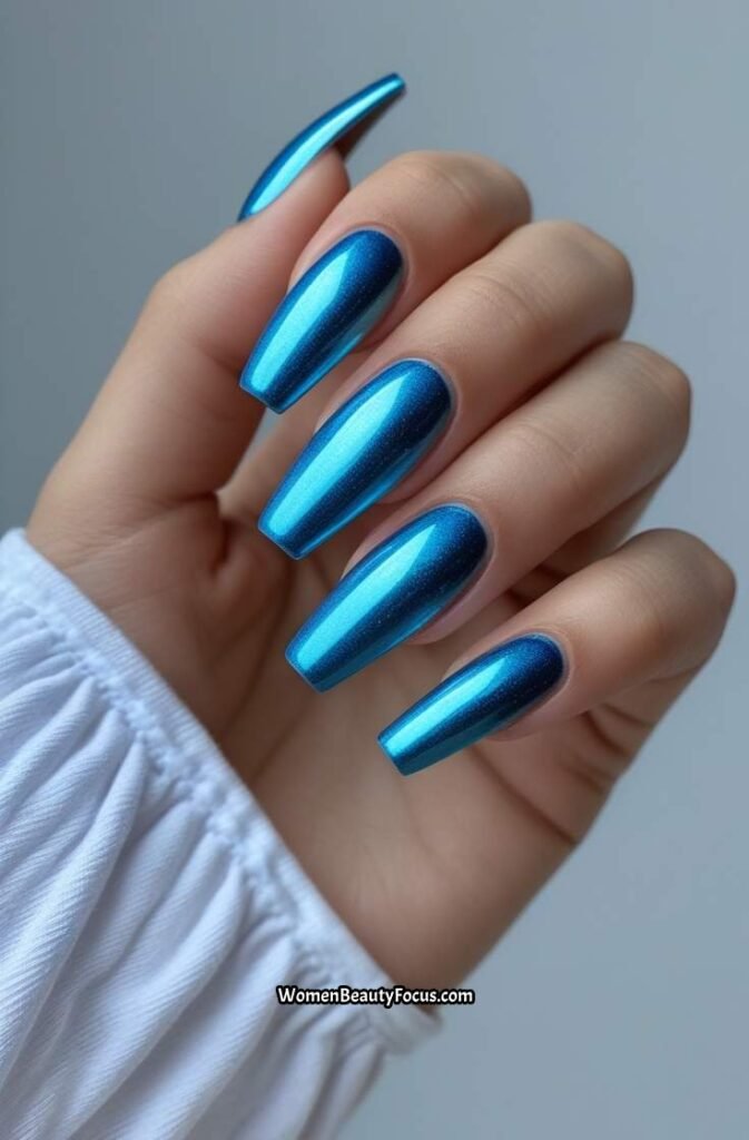 2. Ocean Blue Chrome Nails