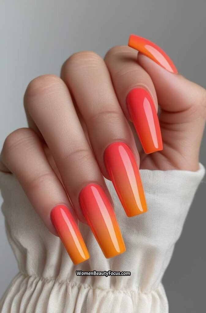2. Orange and Coral Ombre Coffin Nails