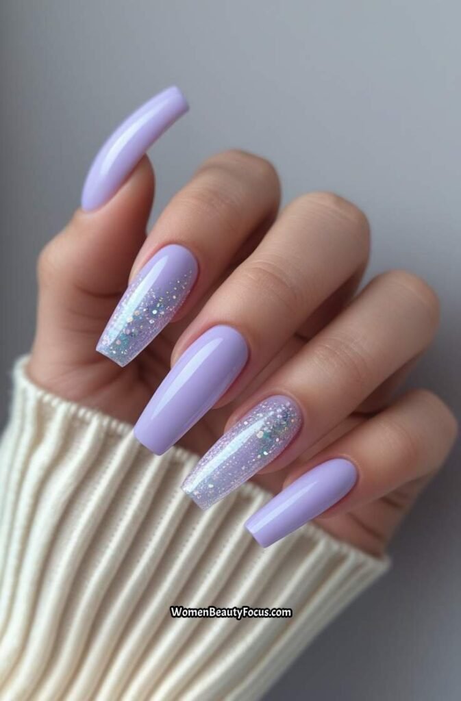 2. Pastel Lavender Coffin Nails with Subtle Glitter