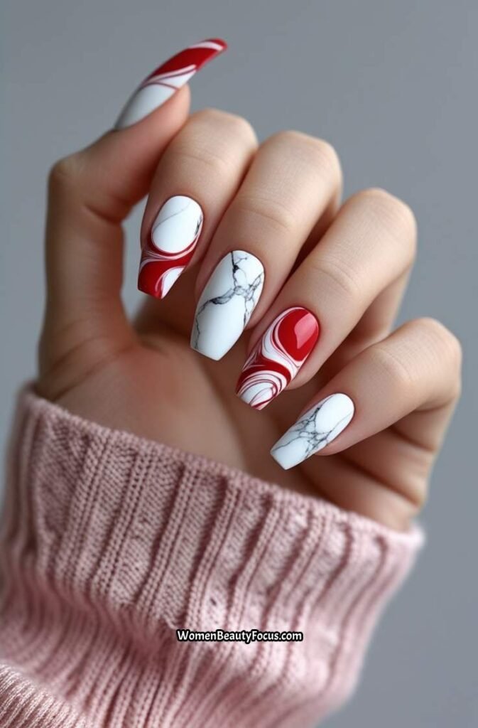 2. Red and White Marble Accent Nails