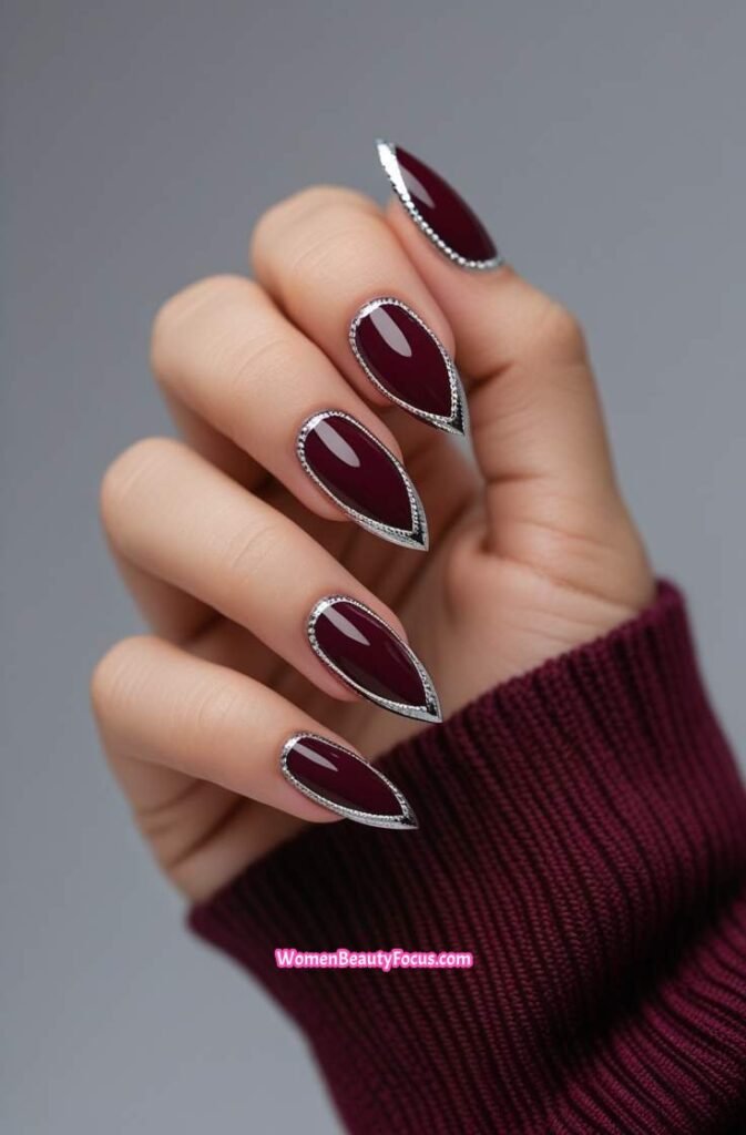 20. Burgundy Cat Eye Nails with Silver Lining