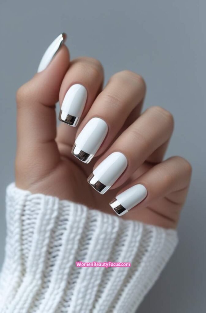 20. Clean White Nails with Metallic Silver Tips
