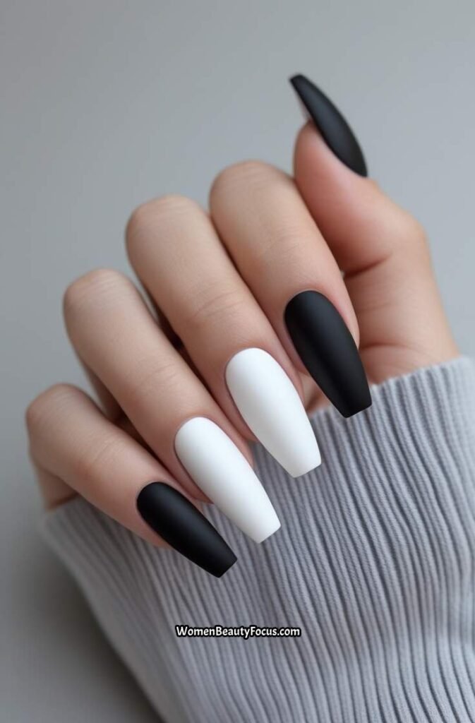 20. Matte Black and White Nails