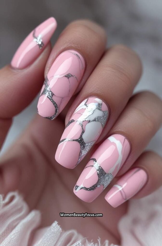 20. Pink Marble Nails with Silver Detailing