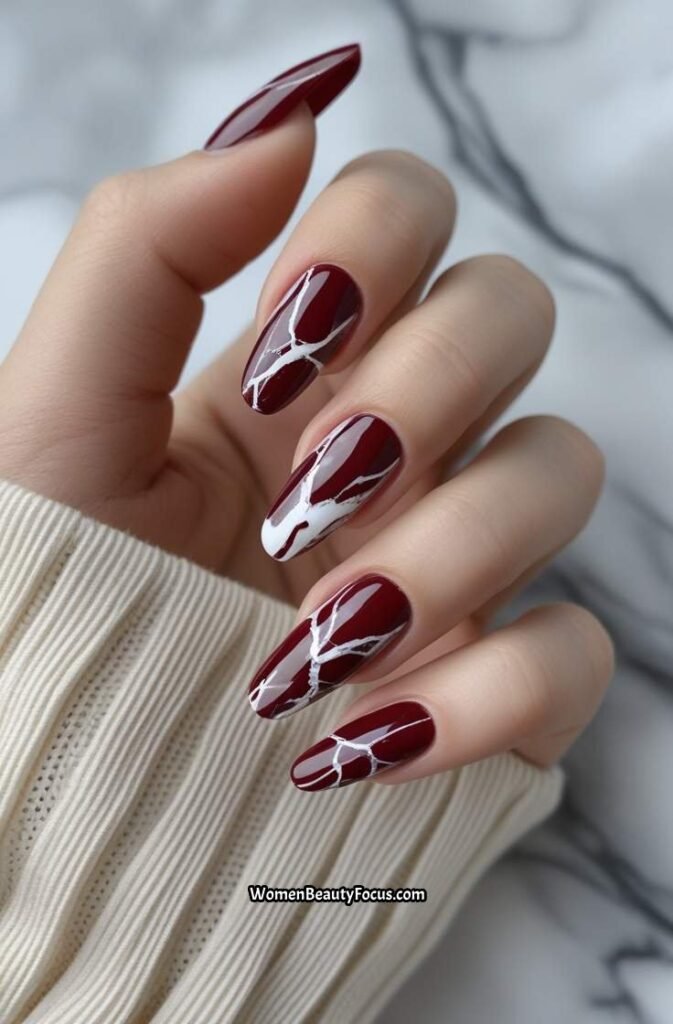 20. Red Marble Nails with White Veins