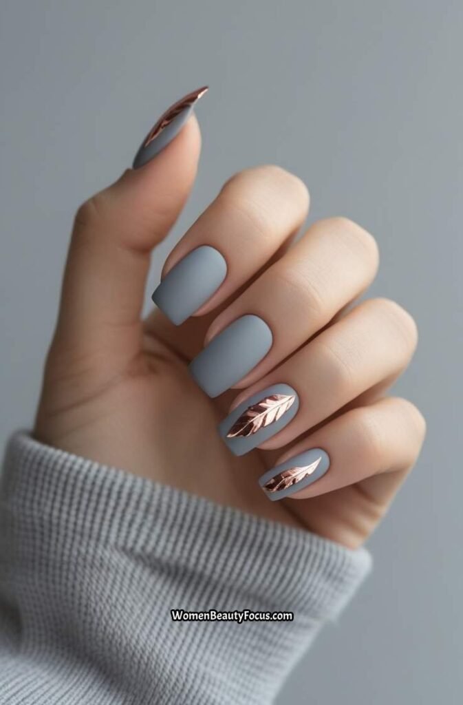 20. Soft Grey Nails with Rose Gold Accents