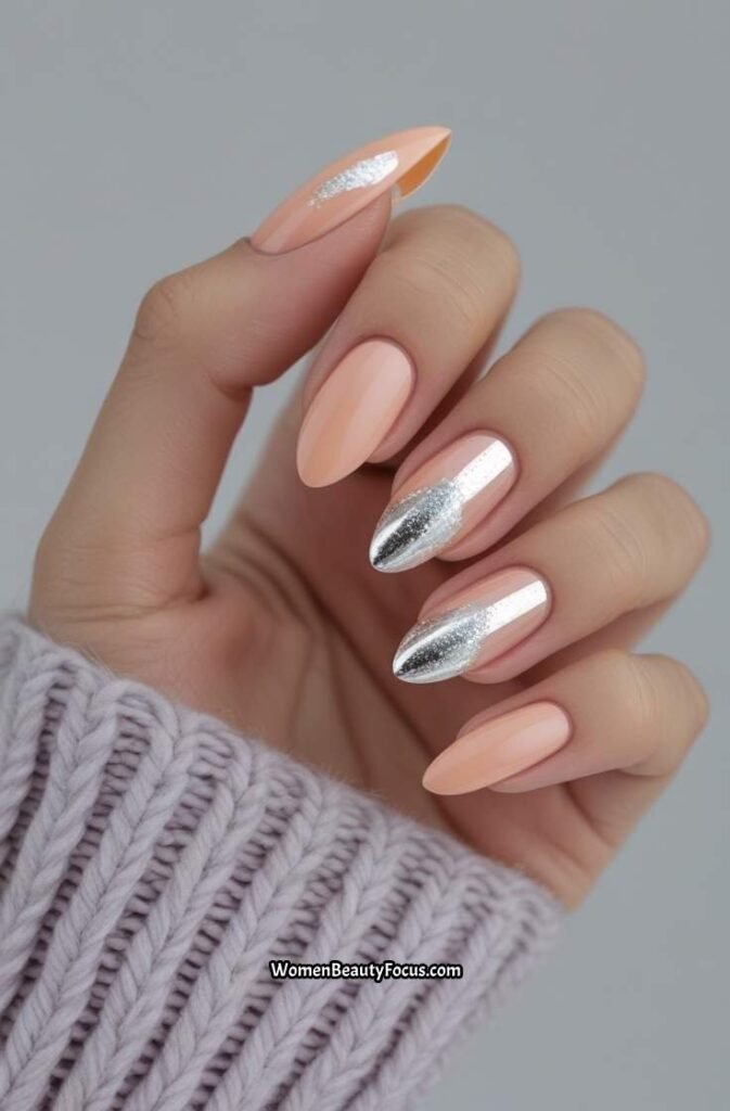 20. Soft Peach Acrylic Nails with Silver Foil Accents