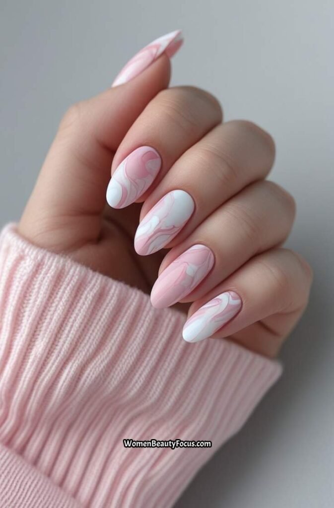 20. Soft Pink Marble Nail Design