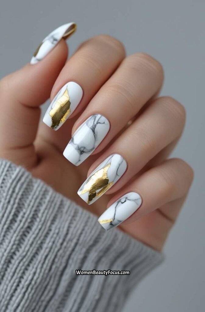 20. White Marble and Gold Leaf Nails