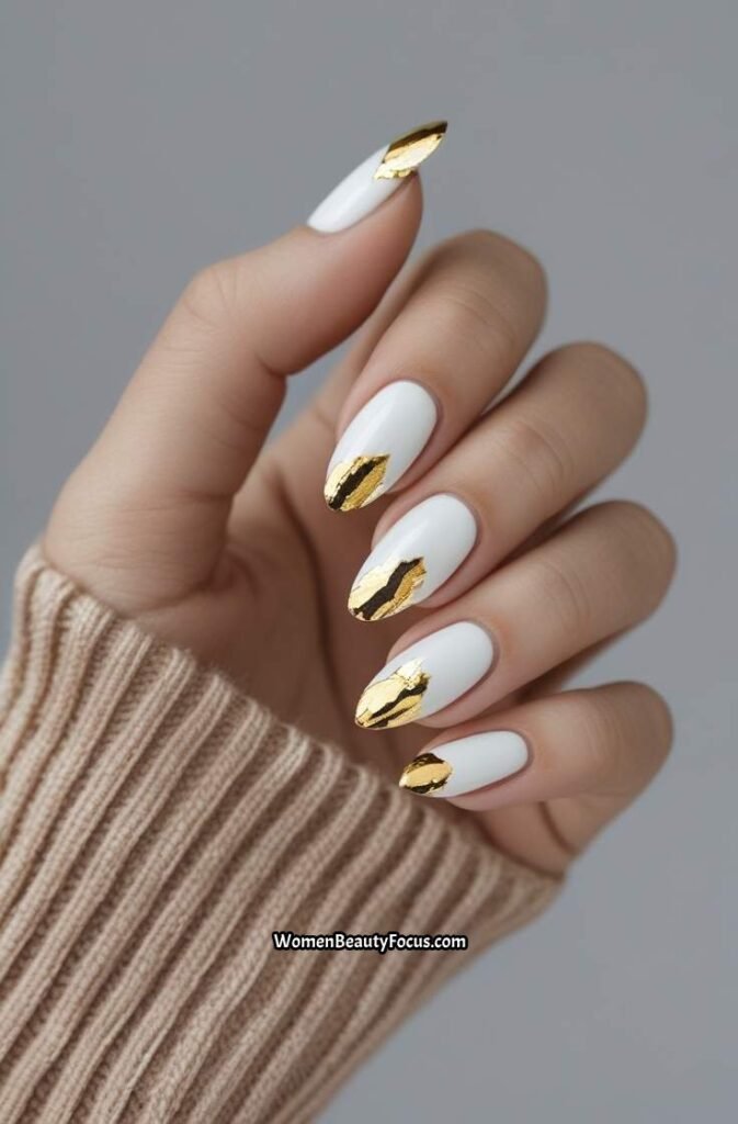 20. White Nails with Gold Leaf Tips