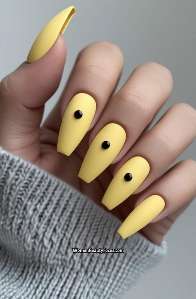 20. Yellow Matte Nails with Black Dots
