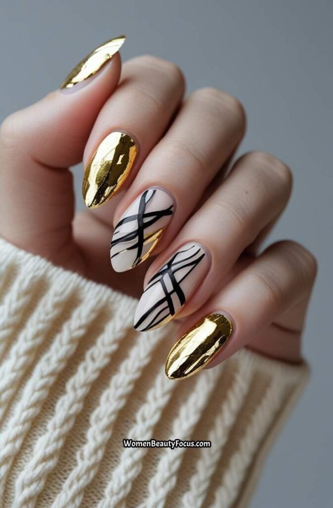 21. Gold Foil Nails with Black Abstract Lines
