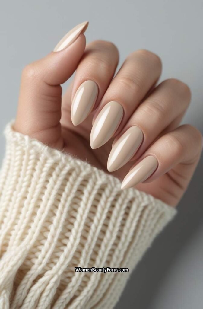 21. Light Beige Glossy Almond Nails