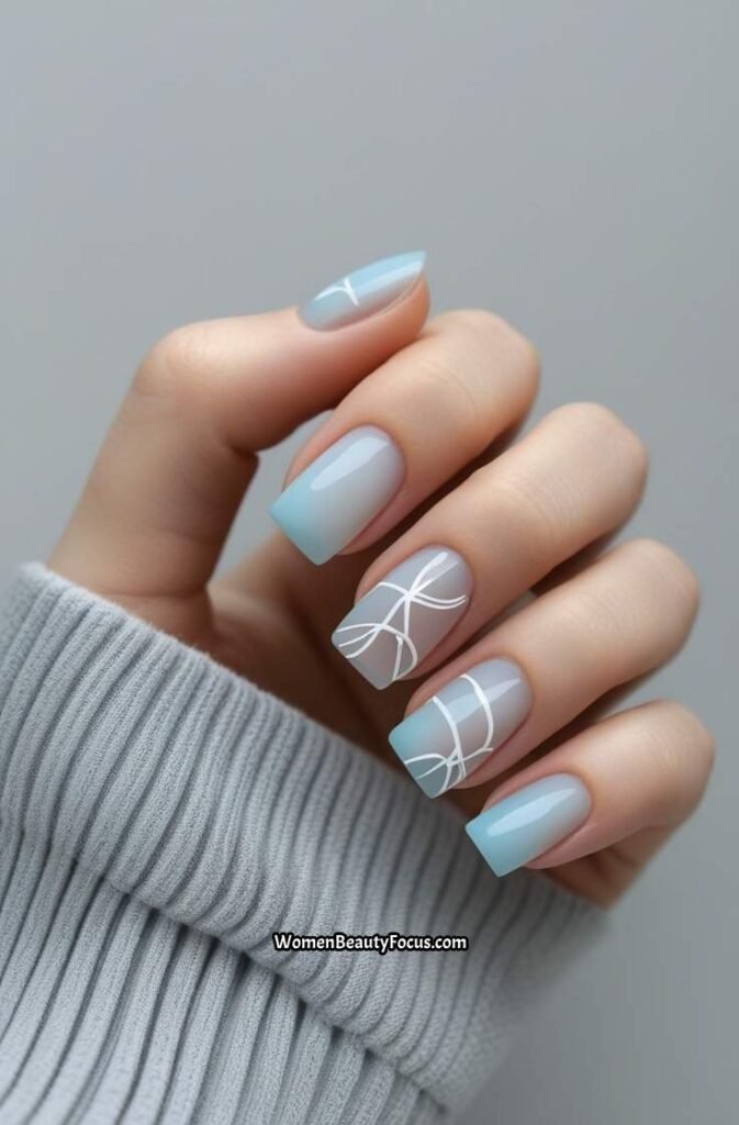 21. Pale Blue Nails with Minimal Line Art