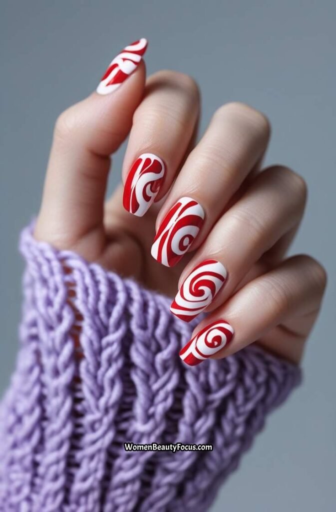 21. Red and White Swirl Nails