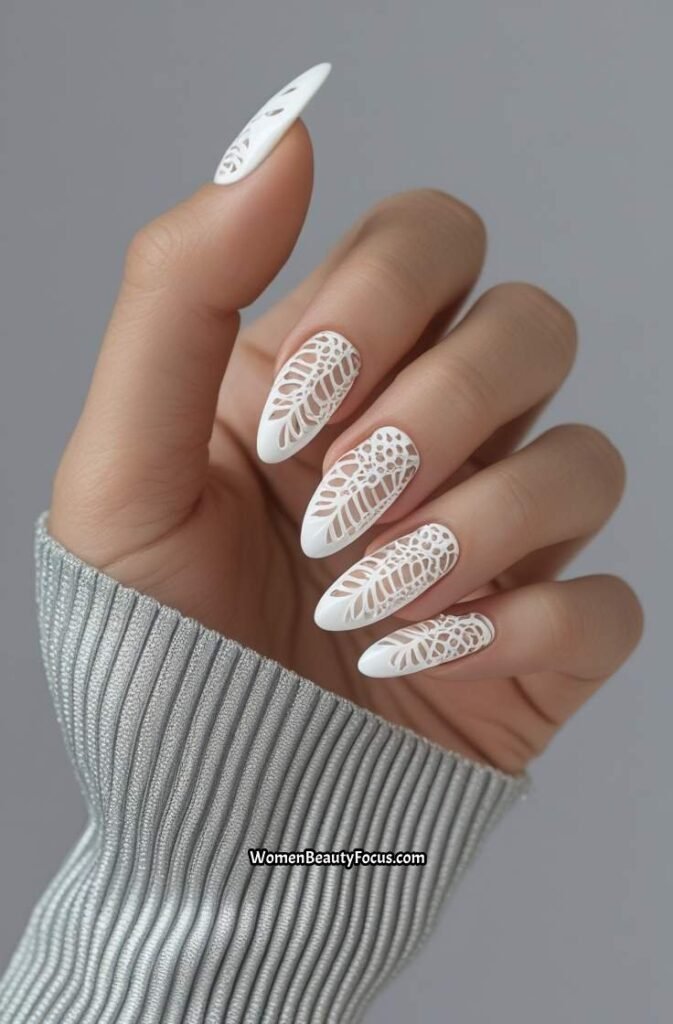 21. White Nails with Lace Inspired Patterns