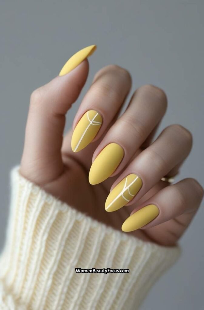 21. Yellow Matte Nails with Minimal White Line Art