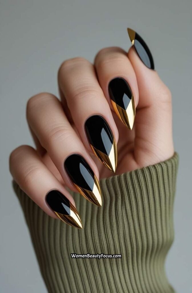 22. Black Nails with Gold Triangle Tips