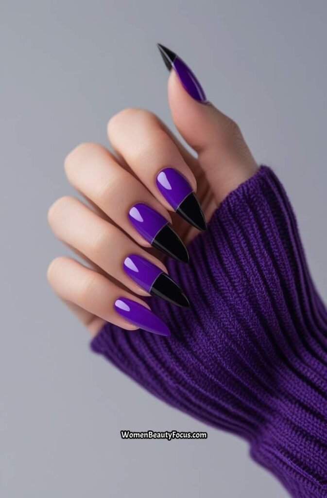 22. Bold Purple and Black Nails