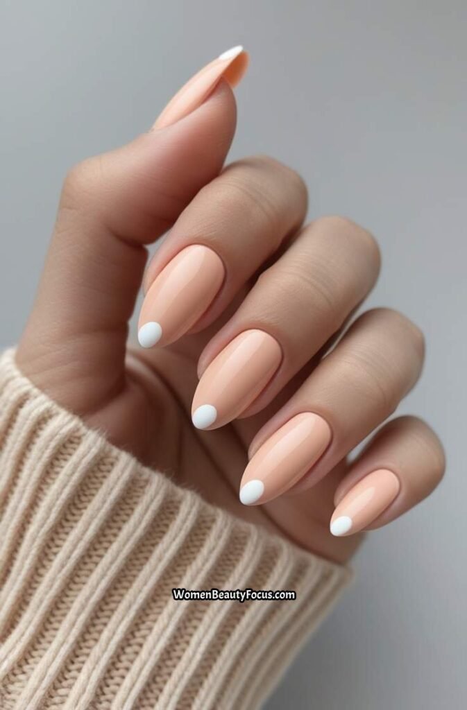 22. Peachy Nails with White Tips and Dots