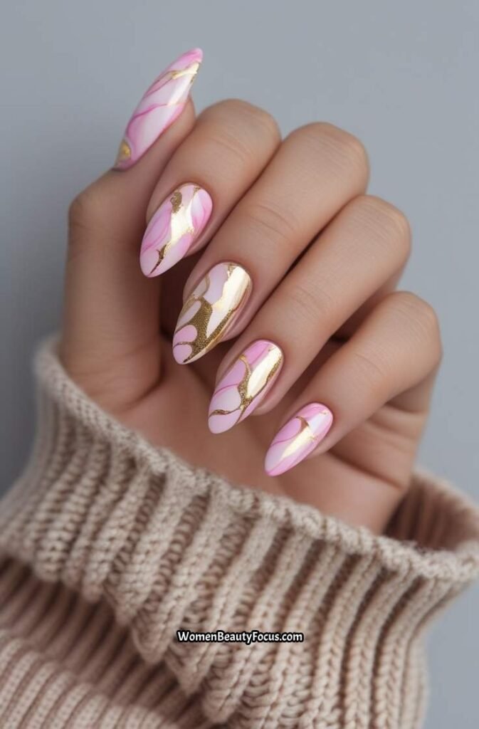 22. Pink and Gold Marble Effect Nails