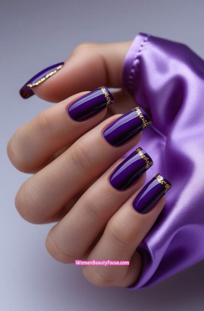 23. Deep Purple Square Nails with Gold Detailing
