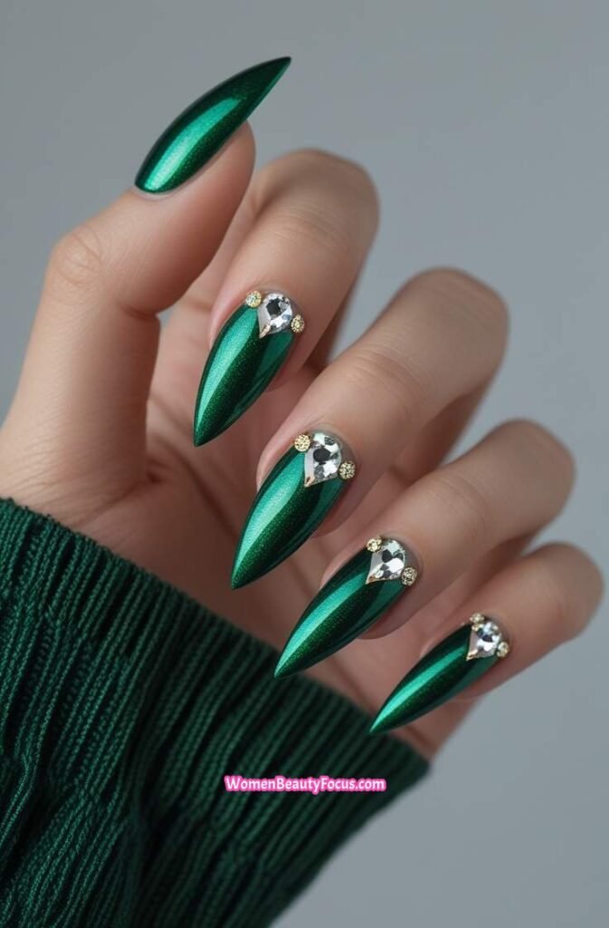 23. Emerald Green Cat Eye Nails with Crystal Embellishments