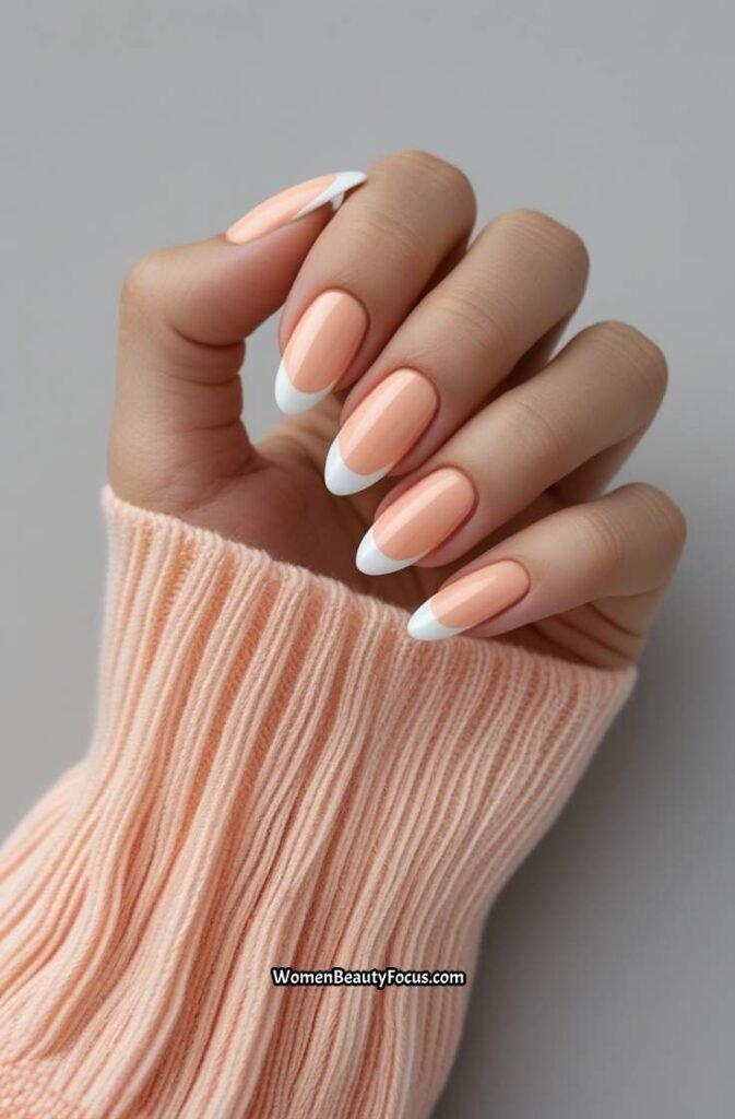 23. Light Peach Nails with Thin White Tips