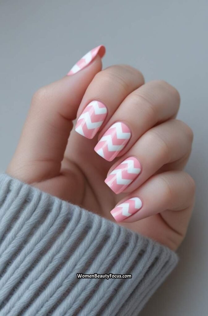 23. Pink and White Chevron Nails for a Chic Look