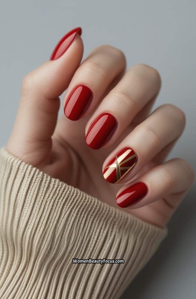 23. Short Glossy Red Nails with Gold Line Art
