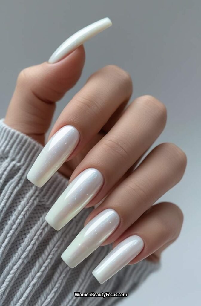 23. Soft White Gel Nails with Pearlescent Sheen