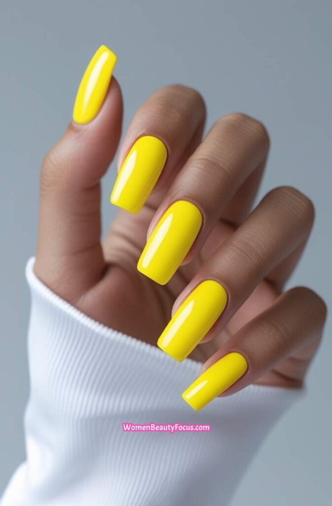 24. Bright Yellow Square Nails