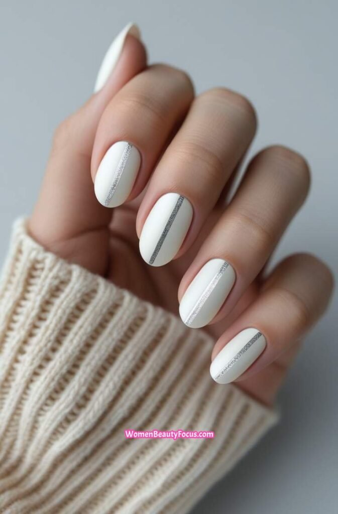 3. Elegant Milky White Nails with Silver Stripes