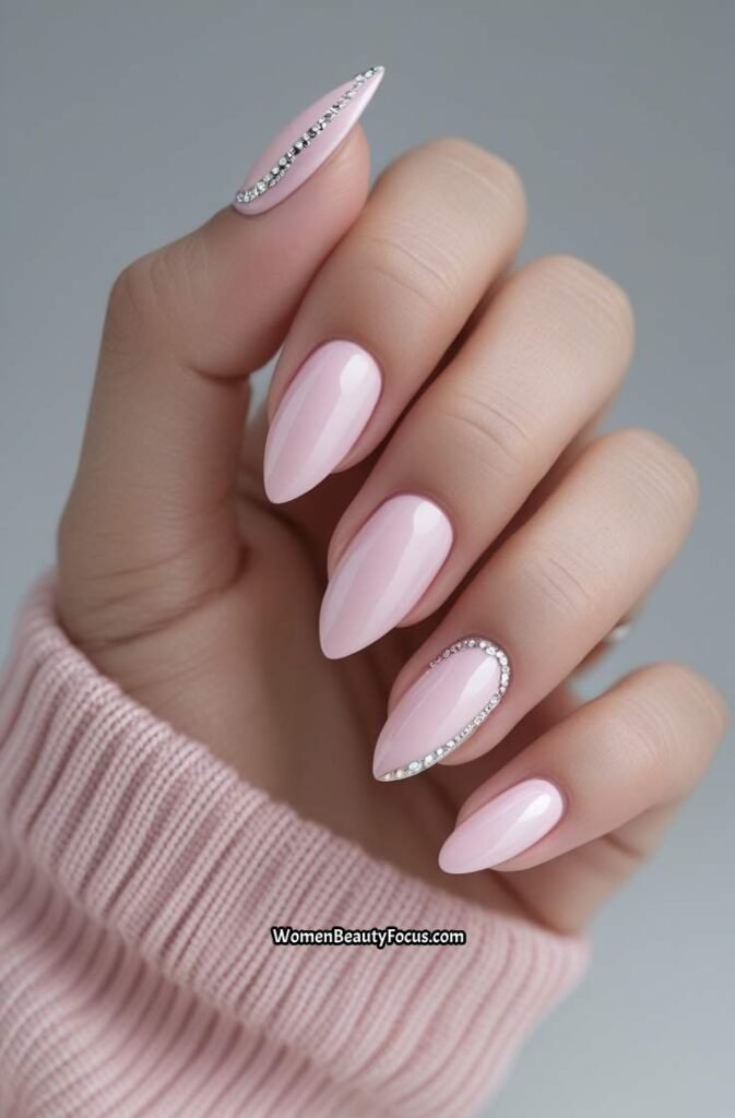 3. Glossy Almond Nails with Soft Pink Accents