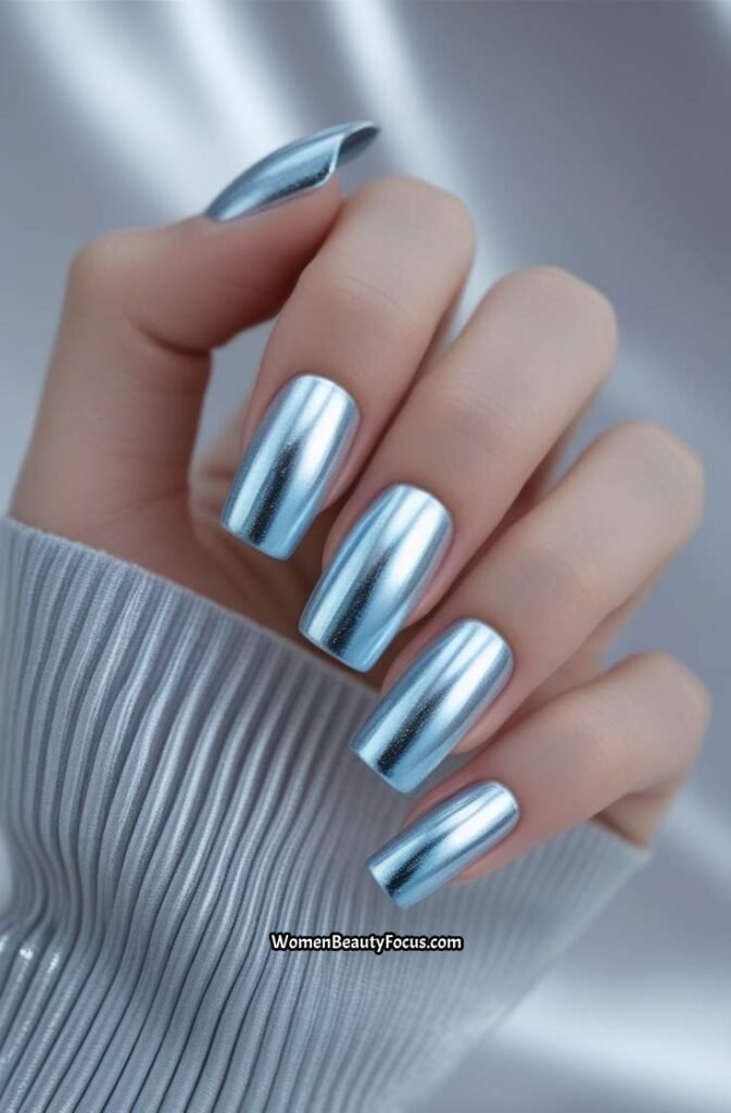 3. Icy Blue Chrome Nails