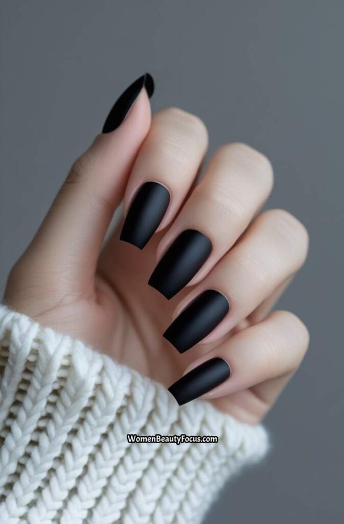 3. Matte Black French Tip Nails