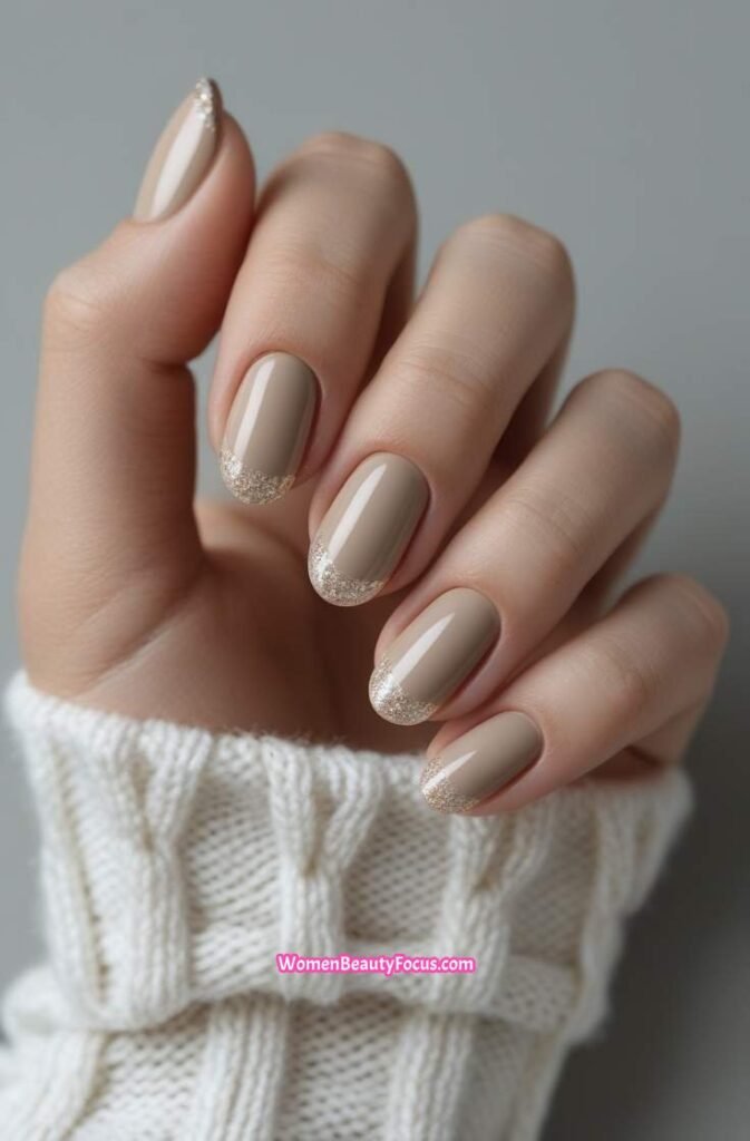 4. Neutral Beige Nails with Subtle Glitter