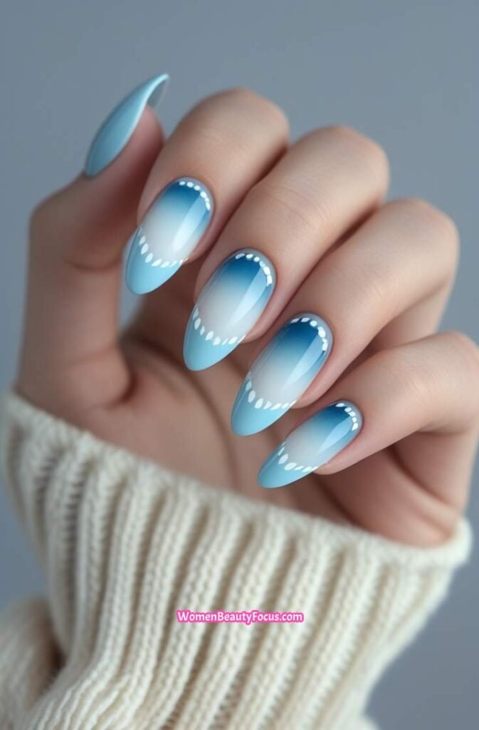4. Soft Blue Cat Eye Nails with White Accents