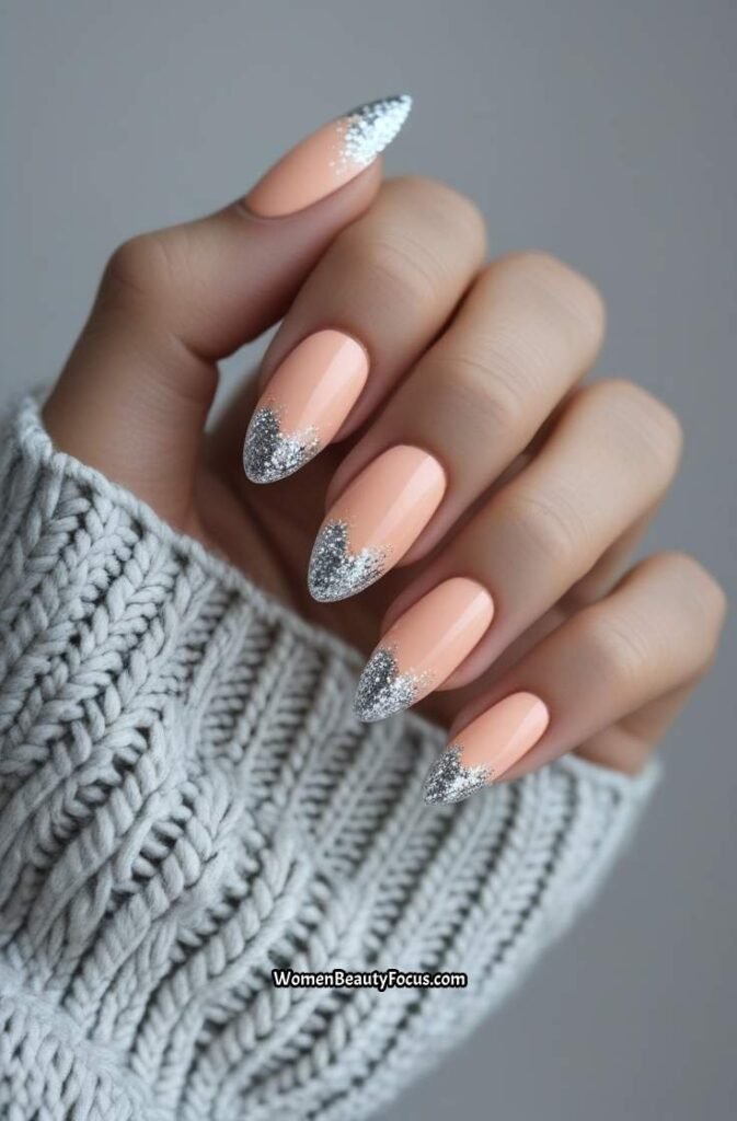 5. Peach Almond Nails with Silver Glitter Tips