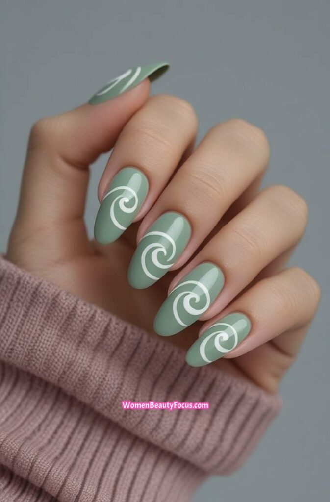 5. Sage Green and White Swirl Nails