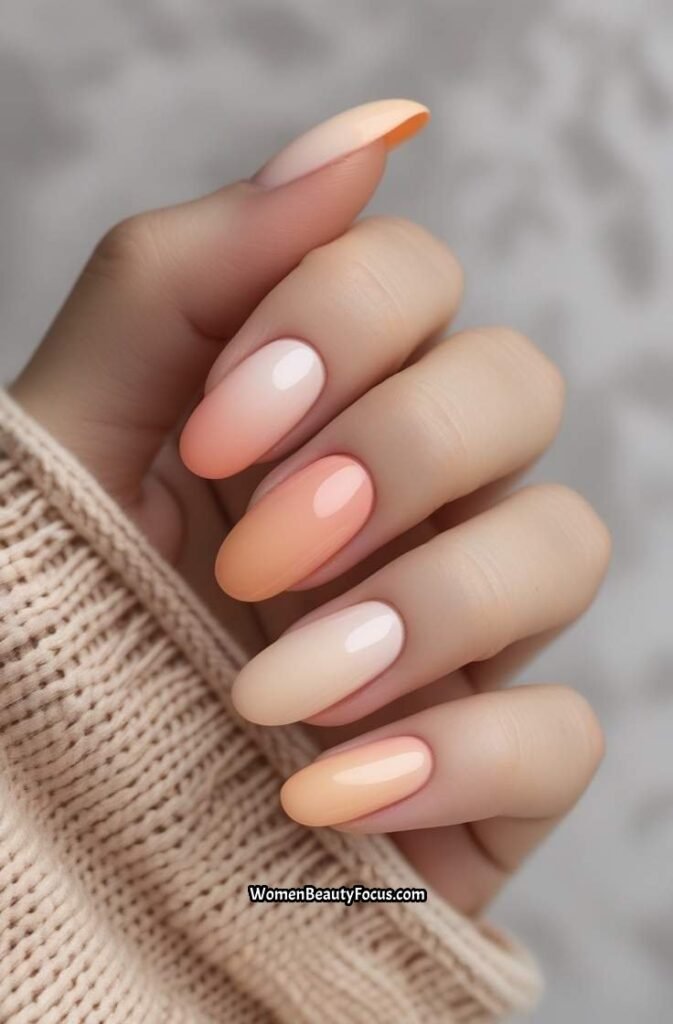 5. Soft Peach Ombre Nails
