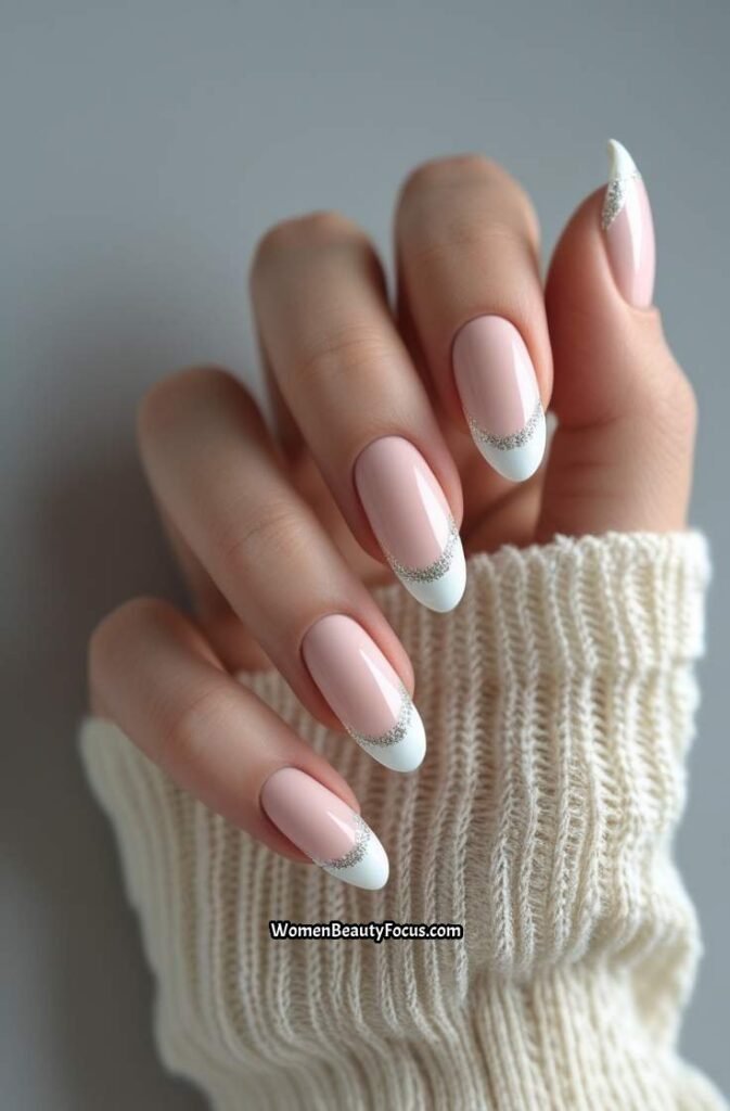 5. Subtle French Tips with Glitter Accents