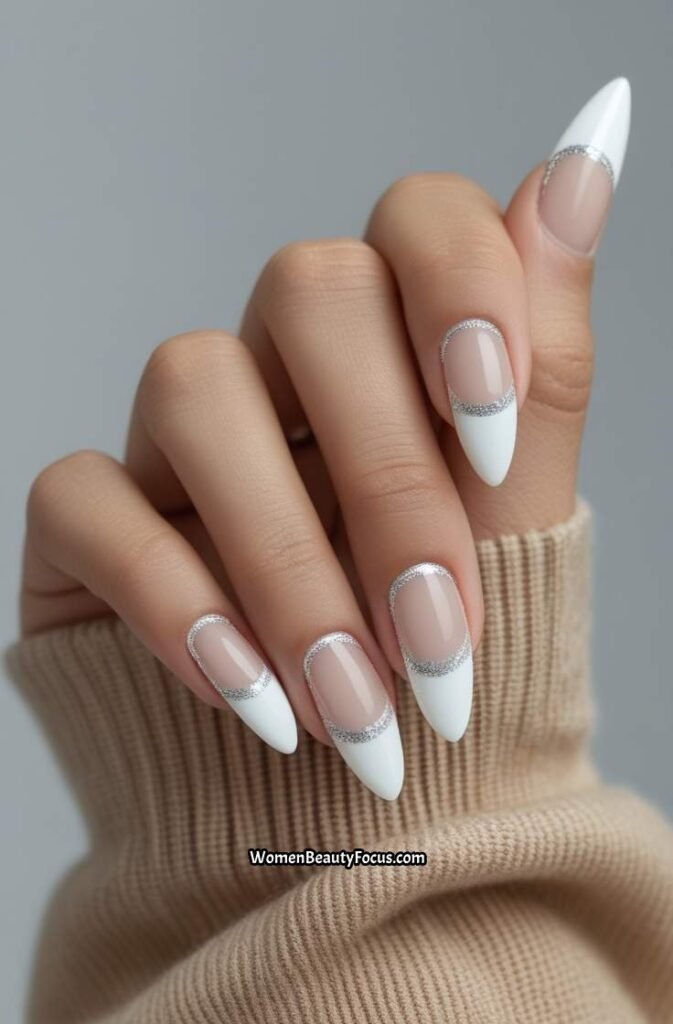 5. White French Tips with a Twist of Glitter