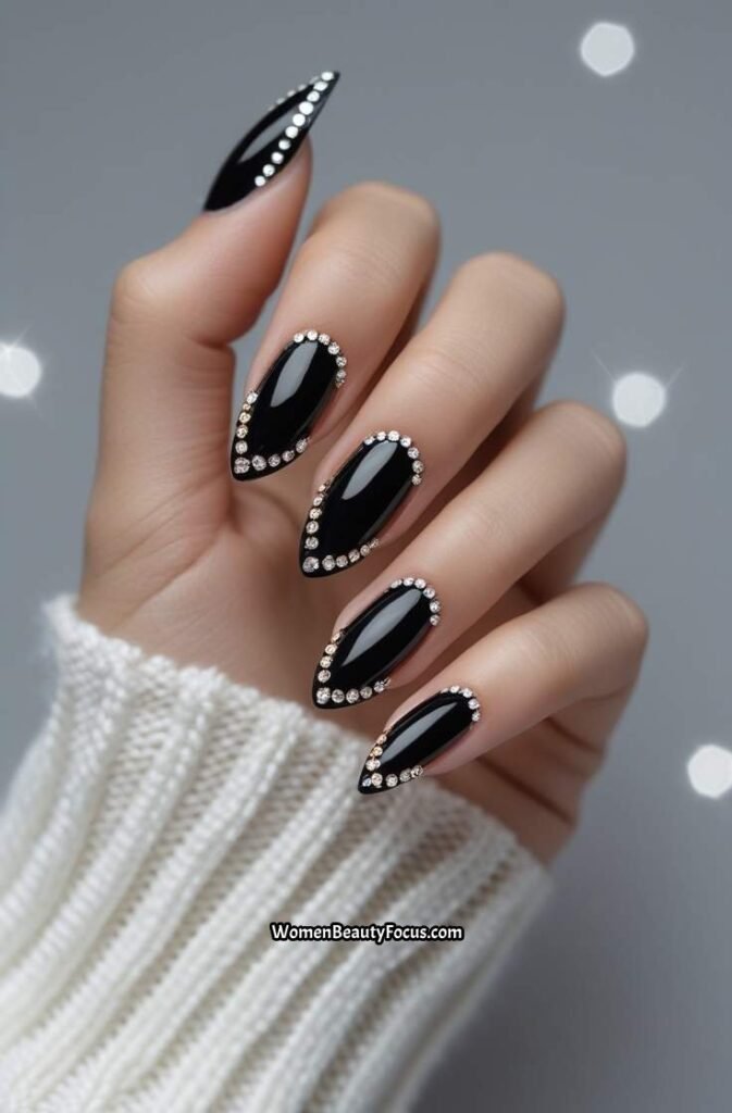 6. Black French Tips with Rhinestone Embellishments