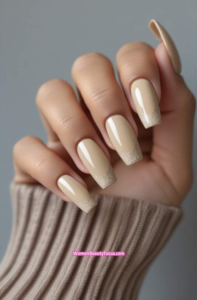 6. Glossy Beige Nails with Micro Sparkle