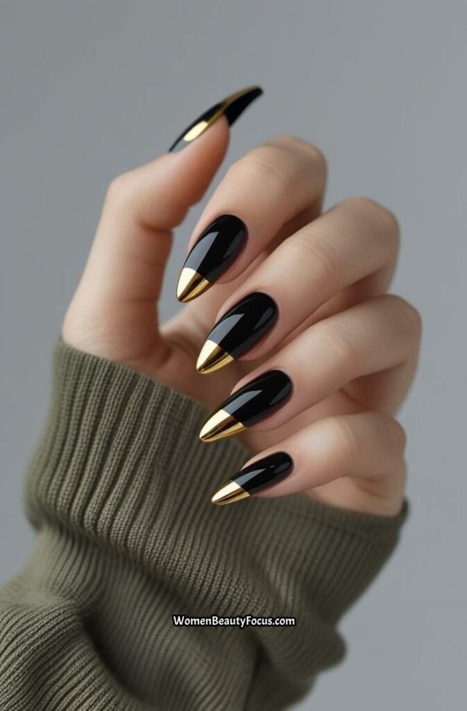 6. Glossy Black and Gold French Tips