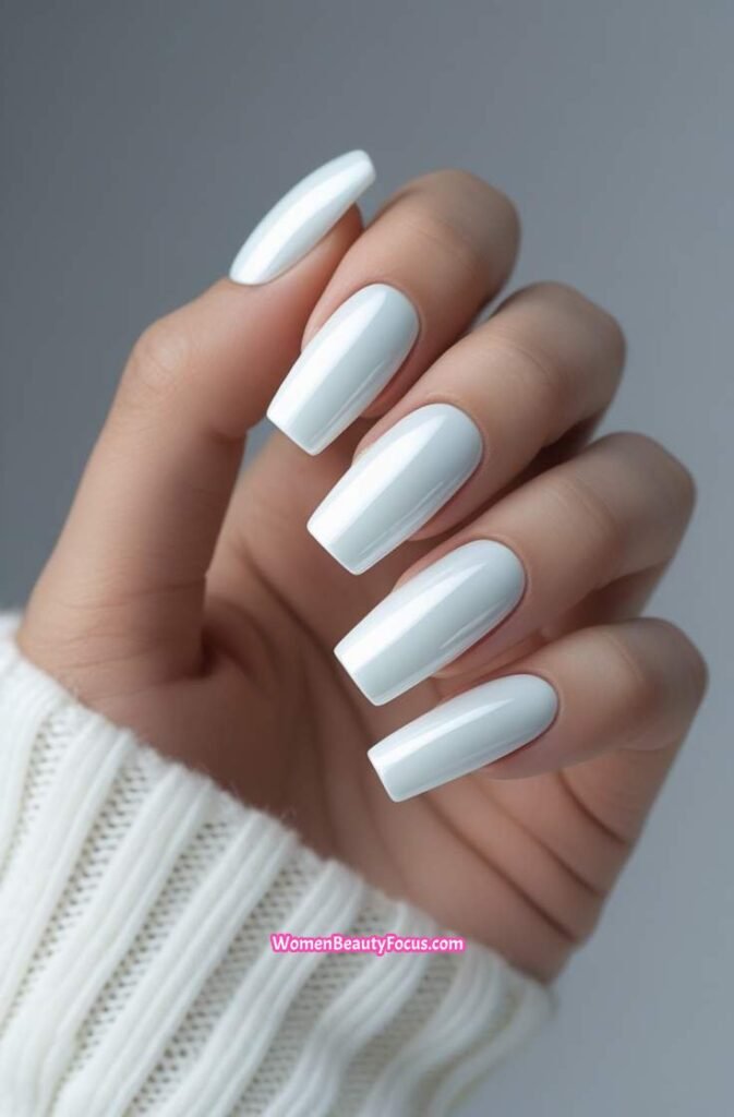 6. Glossy White Chrome Nails with a Sleek Finish