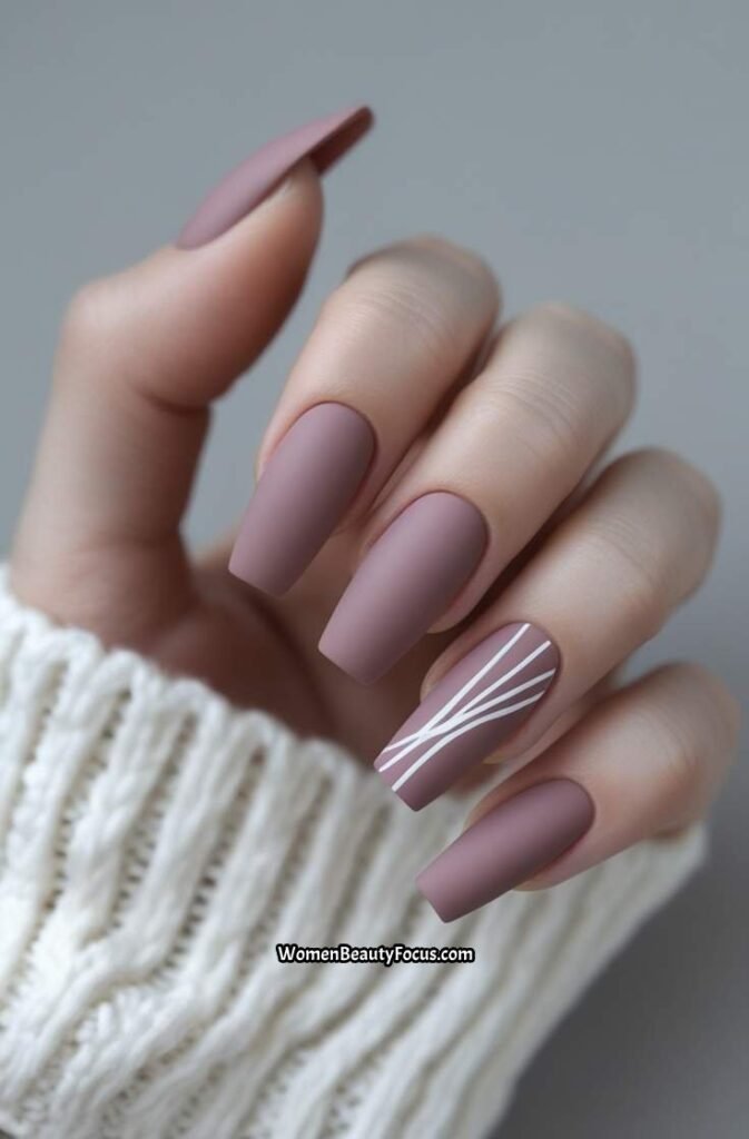 6. Matte Dusty Pink Nails with Minimal Line Art