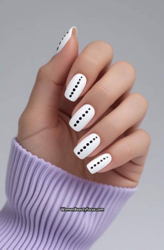 6. Minimalist White Nails with Dot Accents